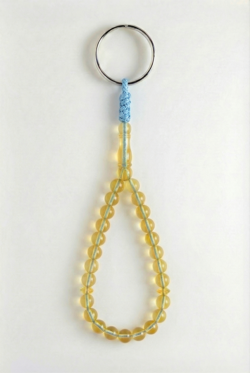 سلسلة مفاتيح من العنبر - سيقنتشر + شاهد وفواصل (25 خرزة)