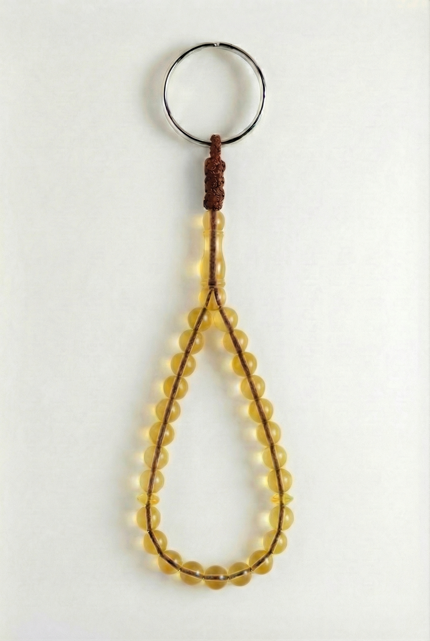 سلسلة مفاتيح من العنبر - سيقنتشر + شاهد وفواصل (25 خرزة)