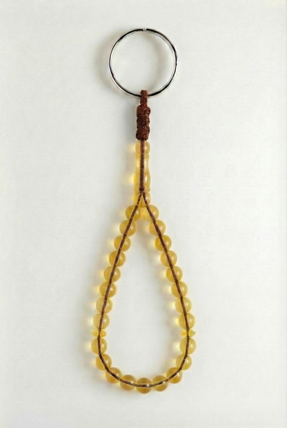 سلسلة مفاتيح من العنبر - سيقنتشر + شاهد وفواصل (25 خرزة)