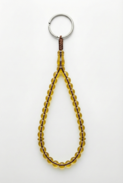 سلسلة مفاتيح من العنبر - ممتدة + شاهد وفواصل (31 خرزة)