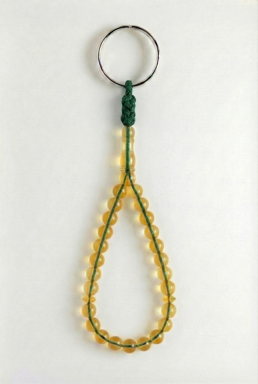 سلسلة مفاتيح من العنبر - سيقنتشر + شاهد وفواصل (25 خرزة)