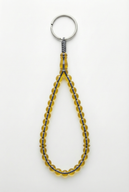 سلسلة مفاتيح من العنبر - ممتدة + شاهد وفواصل (31 خرزة)