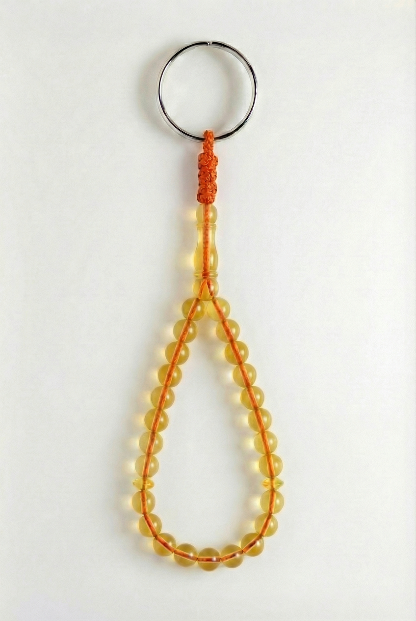 سلسلة مفاتيح من العنبر - سيقنتشر + شاهد وفواصل (25 خرزة)