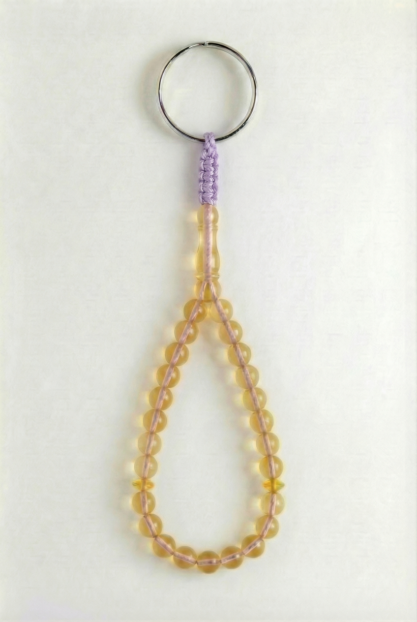 سلسلة مفاتيح من العنبر - سيقنتشر + شاهد وفواصل (25 خرزة)