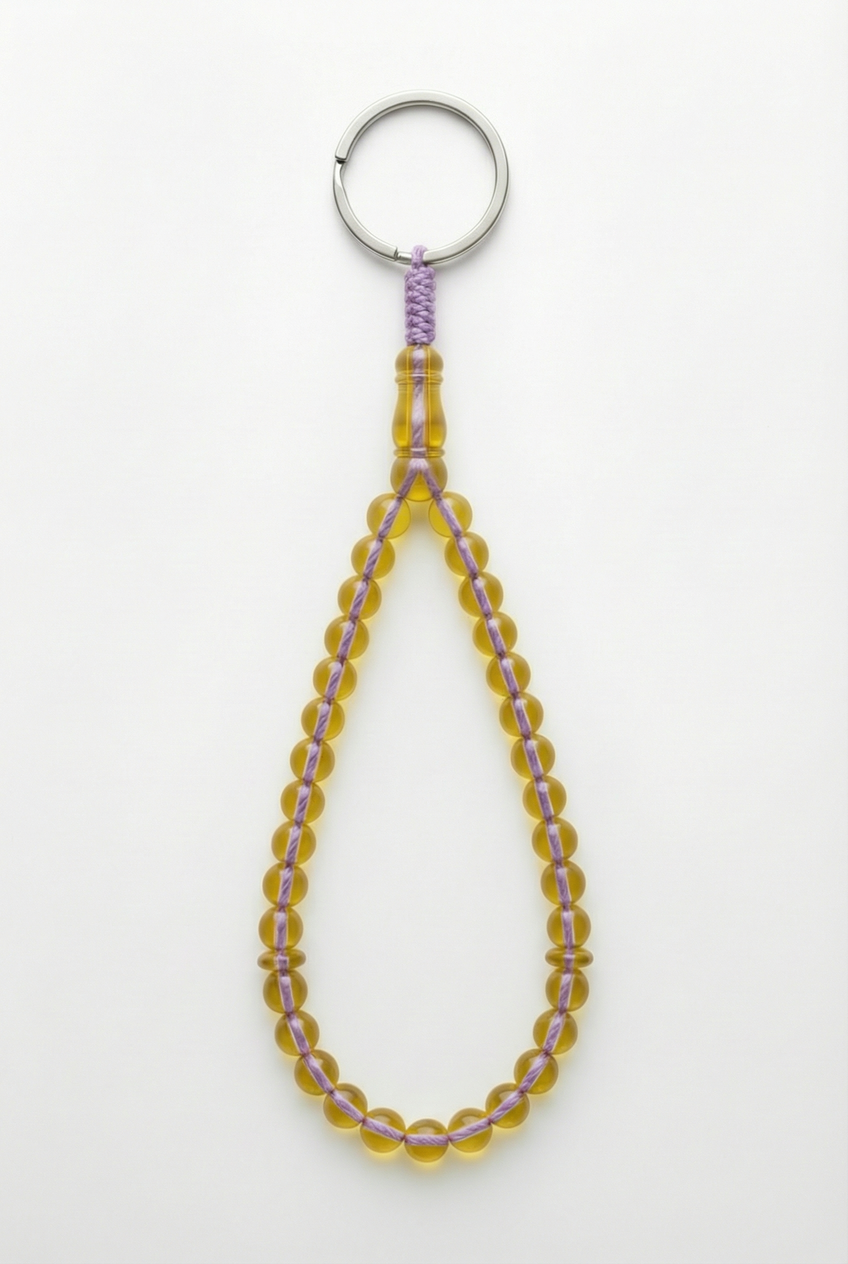 سلسلة مفاتيح من العنبر - ممتدة + شاهد وفواصل (31 خرزة)