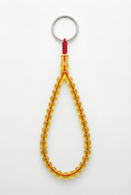 سلسلة مفاتيح من العنبر - ممتدة + شاهد وفواصل (31 خرزة)