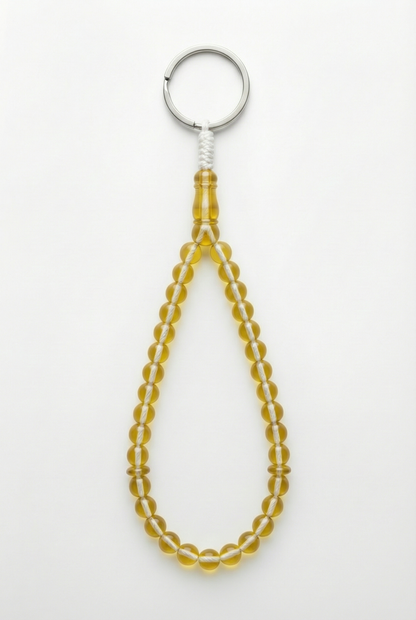 سلسلة مفاتيح من العنبر - ممتدة + شاهد وفواصل (31 خرزة)